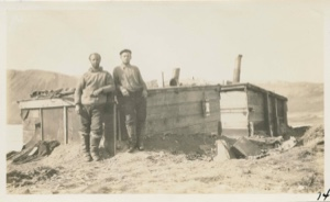 Image of Donald B. MacMillan and Jack Barnes at hut (Fort Conger)